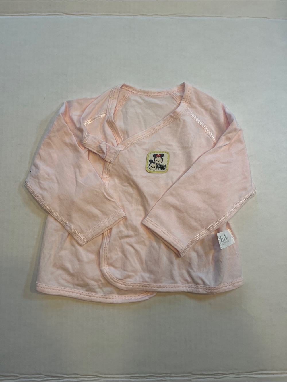 Baby Pink Wrap-Front Long Sleeve Top with Cute Patch